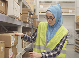 Image.  Staff scanning boxes