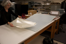 Provide adequate space and support when handling oversize materials. NY State Archives, Albany, NY.